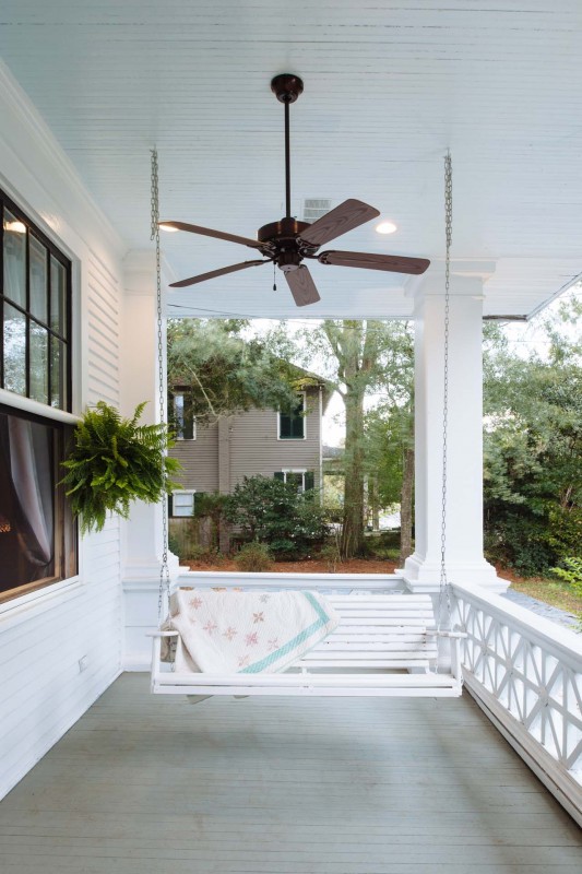 Charming front porch swing restored 1906 home in Mobile, Alabama
