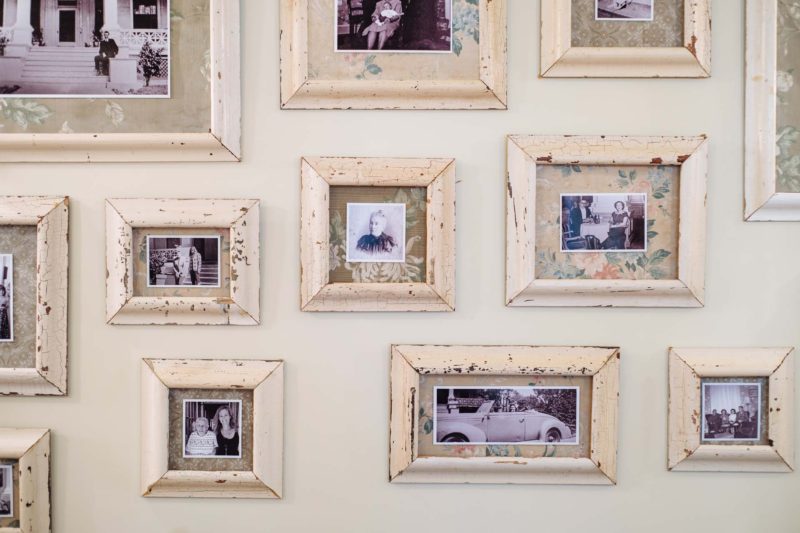 Preserving the original wallpaper of the home framed images showcase the homeowners who loved and lived in the home